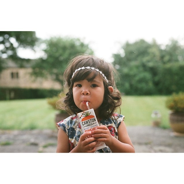 Girl drinking juice box